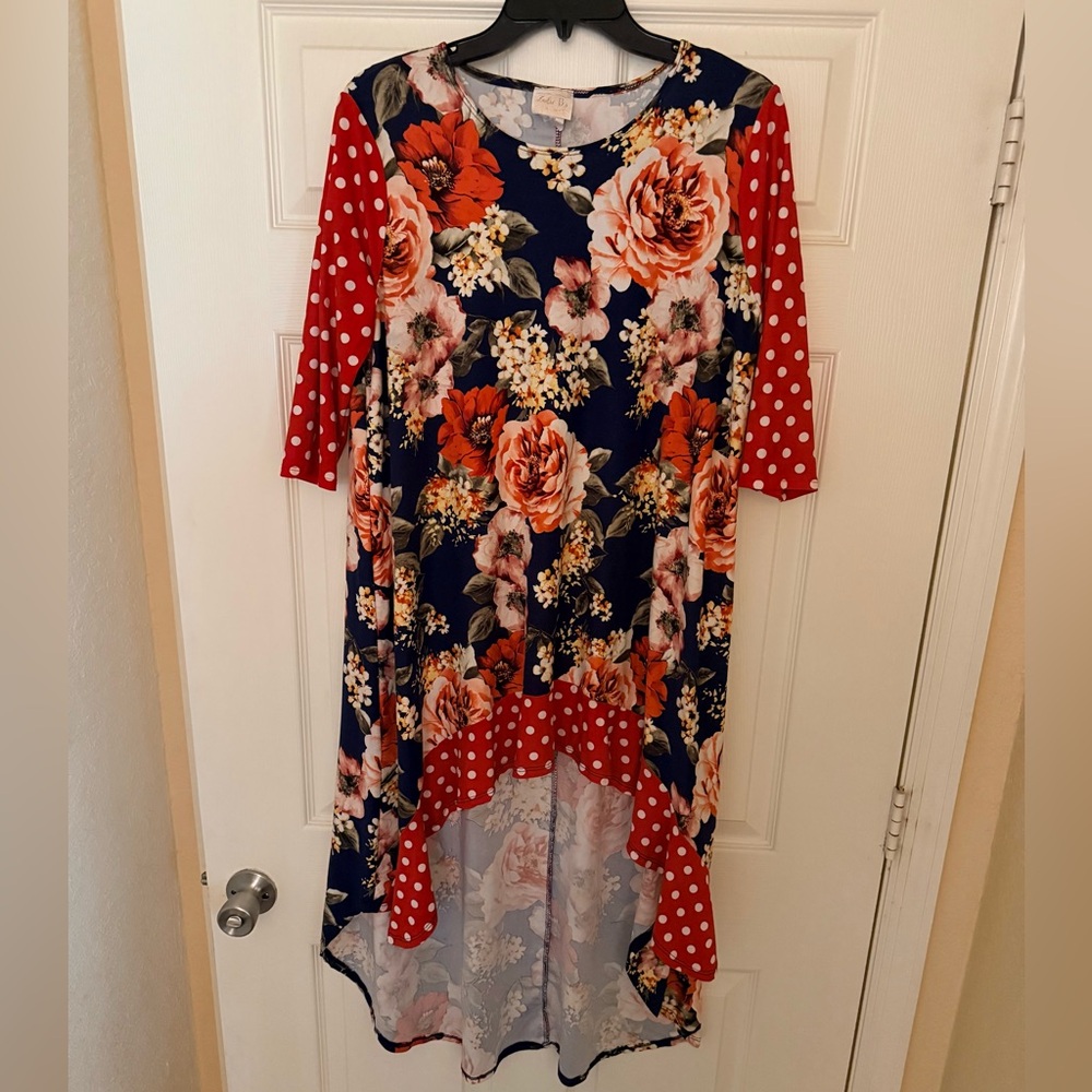 Zadie B’s Polka Dot Women's high/low blouse. Goes great with a layering slip.